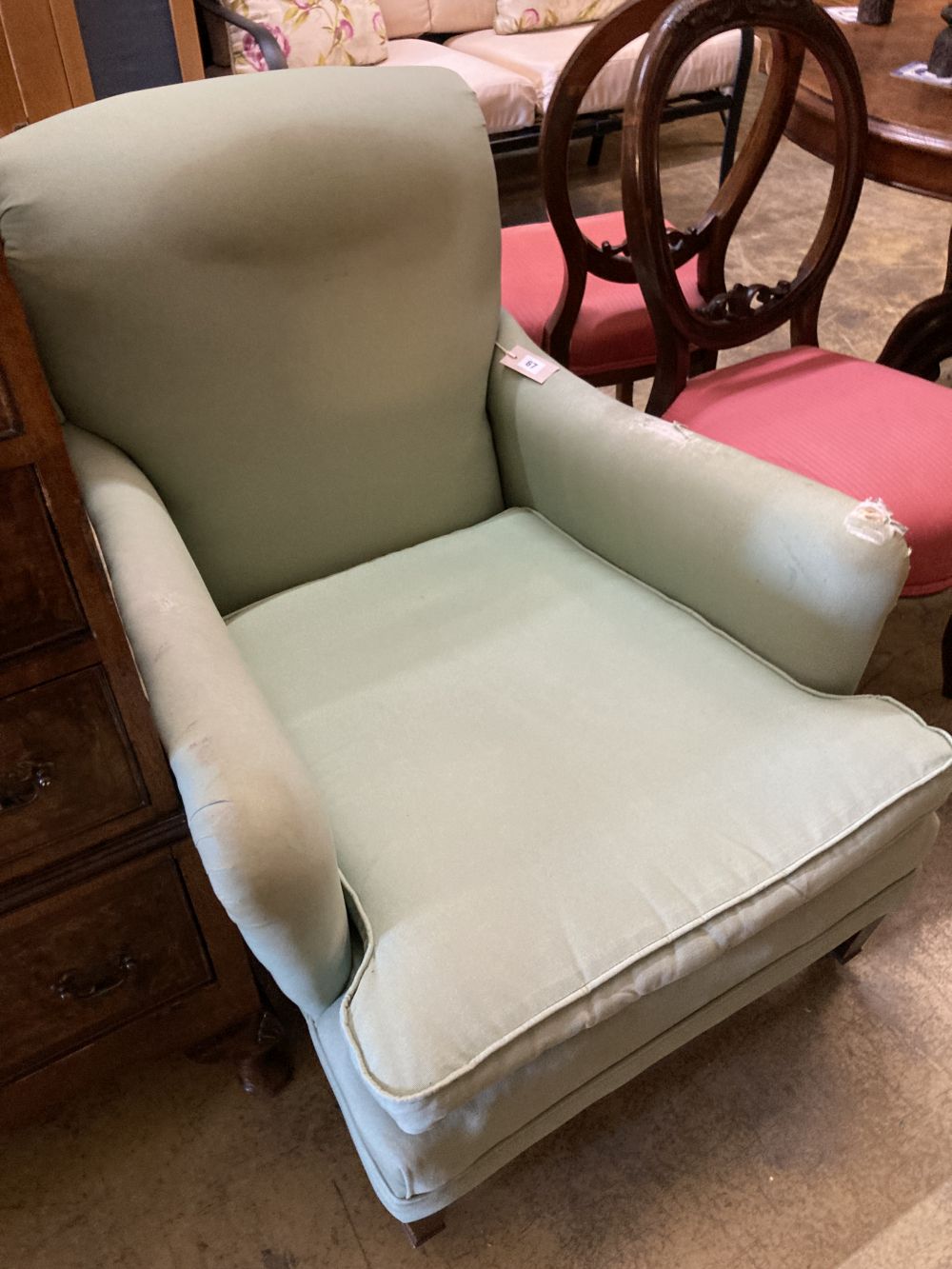 An Edwardian upholstered armchair, width 71cm, height 80cm